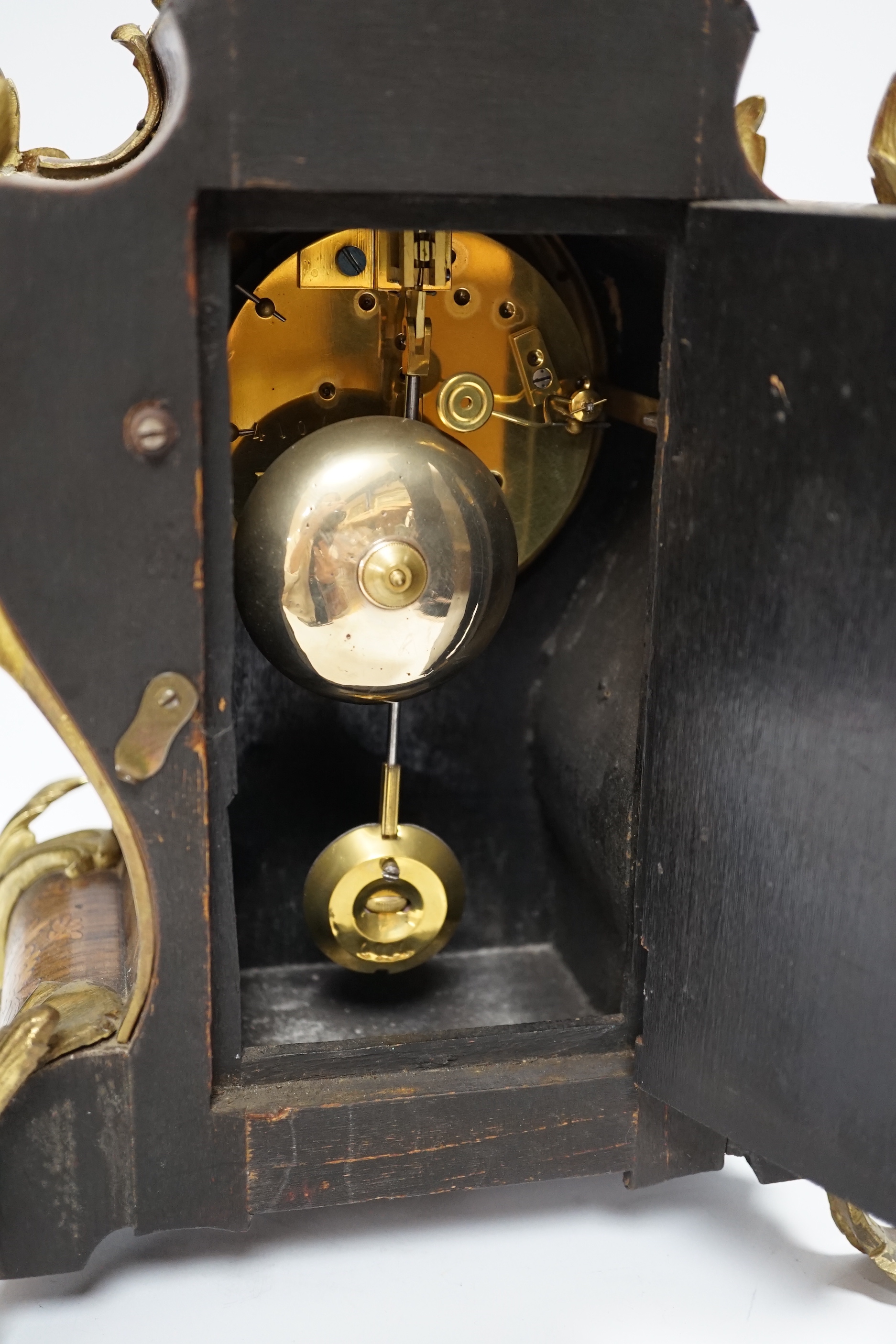 A French gilt metal mounted rosewood mantel clock. 40cm
